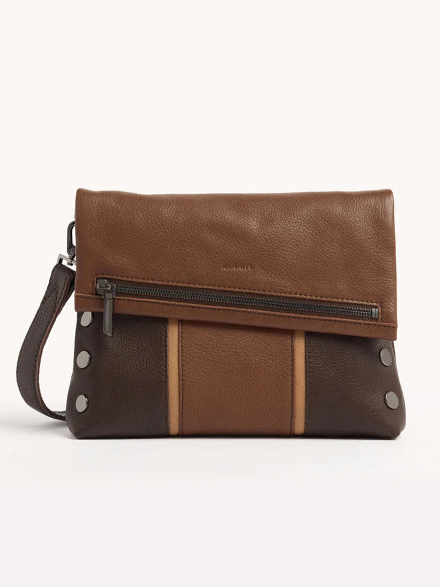 The Hammitt Los Angeles VIP Medium Clutch in Orchestra Brown is crafted from brown leather and features a convenient wrist strap, front zipper pocket, and striking metal rivets. It also includes a removable crossbody strap for versatile wear.