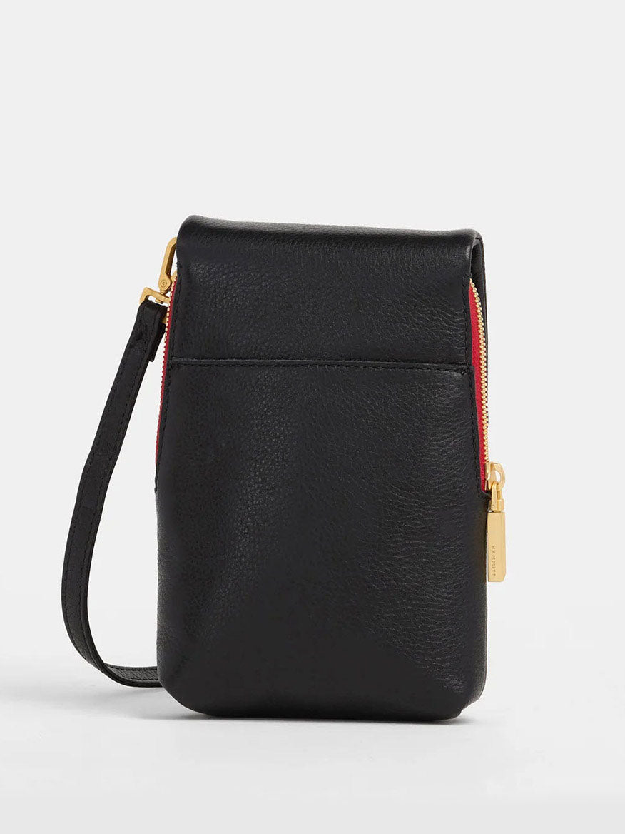 The Hammitt Los Angeles VIP Mobile bag in Black features a pebbled leather design with brushed gold hardware, a red zipper, a front pocket, and a detachable strap for versatile styling.