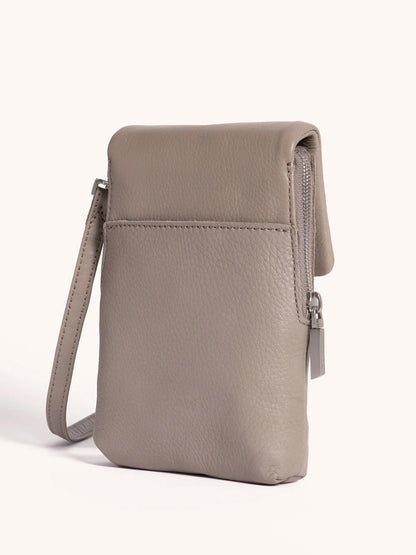 The Hammitt Los Angeles VIP Mobile in Pewter/Brushed Silver is a compact crossbody made from pebbled leather with a front cellphone pocket, zip closure, and wrist strap, shown upright against a simple light background.
