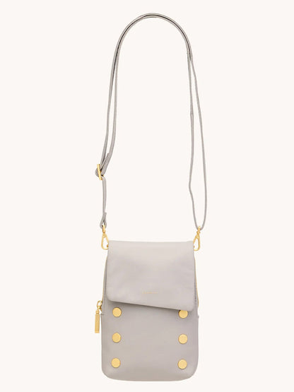 The Hammitt Los Angeles VIP Mobile in Stormy/Brushed Gold is a grey crossbody bag with gold accents, crafted from premium pebble leather.