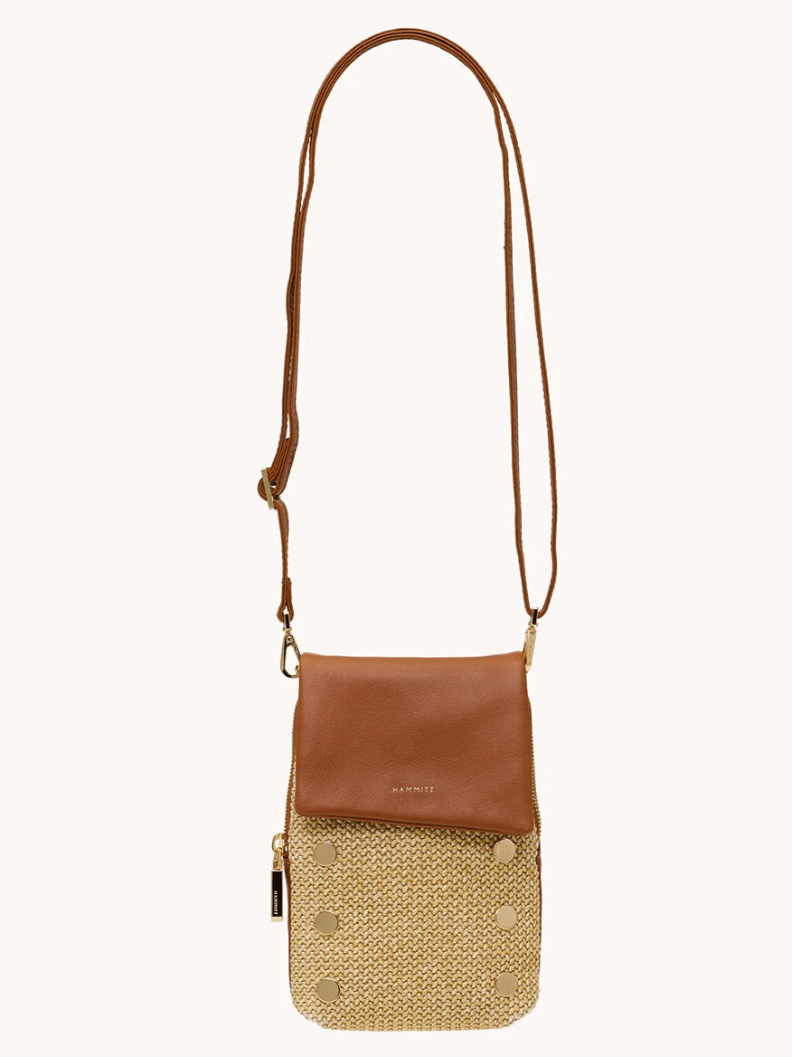 The Hammitt Los Angeles VIP Mobile in Cocoa Raffia/Gold is a compact crossbody featuring a brown pebbled leather flap, adjustable strap, and beige woven front pocket with gold button accents.
