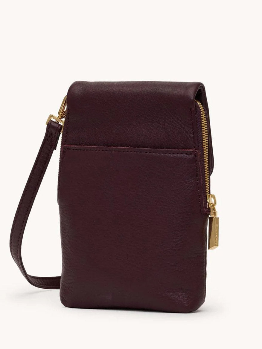 The Hammitt Los Angeles VIP Mobile in Regatta Stripe/Gold is a small, rectangular dark brown leather crossbody with a matching strap, gold zipper, front pocket, and subtle Regatta Stripe detail for classic style.