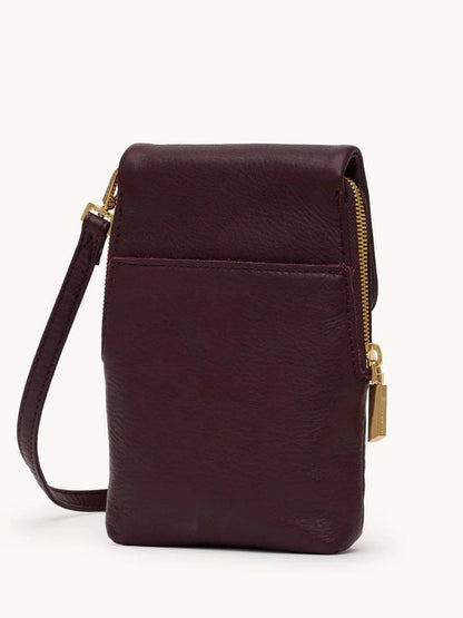 The Hammitt Los Angeles VIP Mobile in Regatta Stripe/Gold is a small, rectangular dark brown leather crossbody with a matching strap, gold zipper, front pocket, and subtle Regatta Stripe detail for classic style.