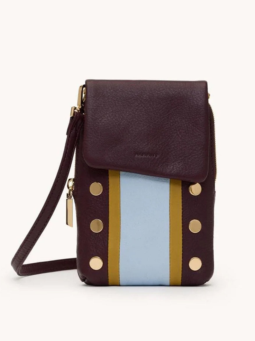 The Hammitt Los Angeles VIP Mobile in Regatta Stripe/Gold is a burgundy leather crossbody bag with a fold-over flap, gold studs, a blue Regatta Stripe bordered by yellow, and a wrist strap for versatile style.