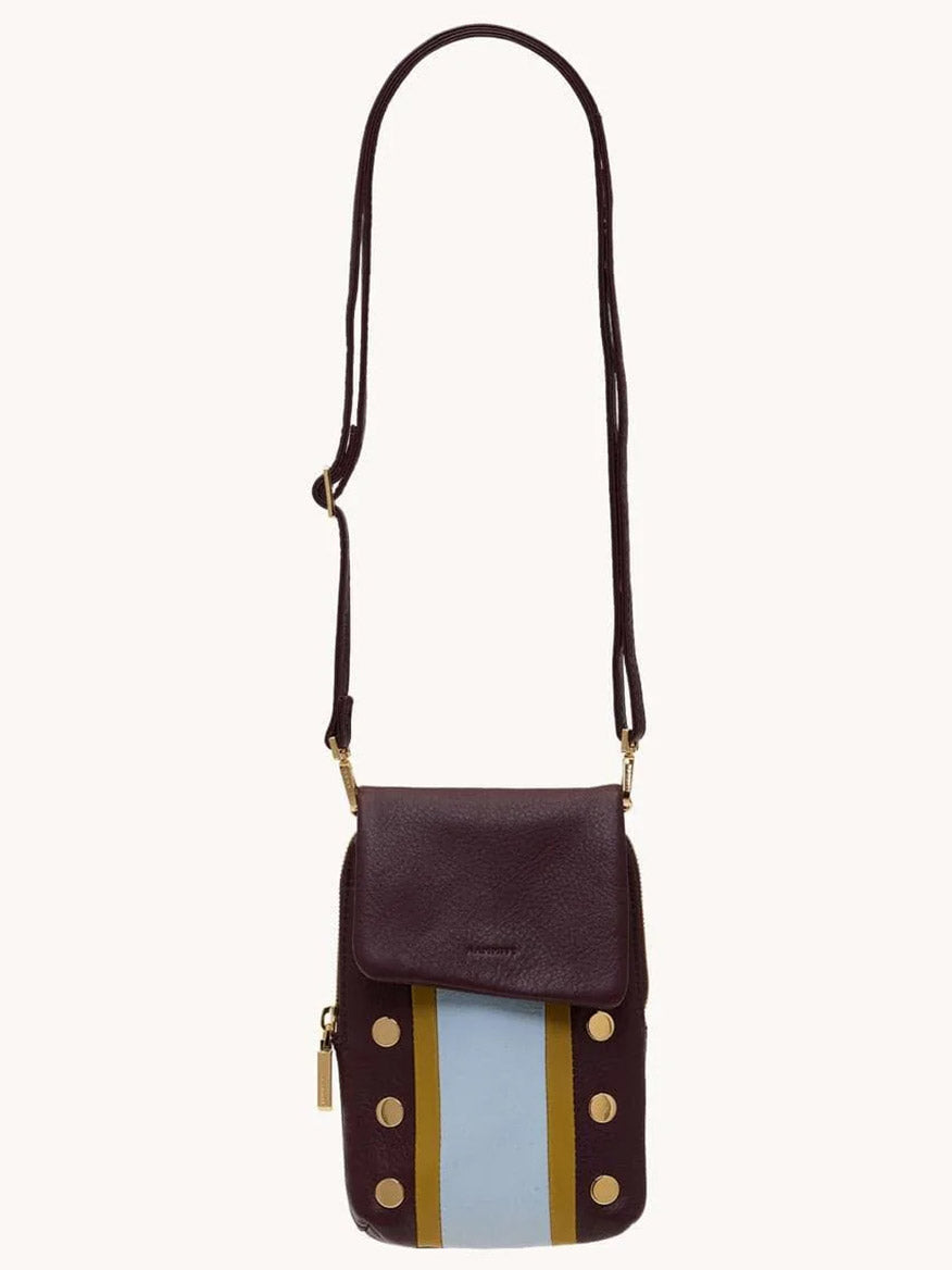 The Hammitt Los Angeles VIP Mobile in Regatta Stripe/Gold features bold blue and yellow stripes, gold accents, a front flap, and long strap—perfect for carrying essentials in style.