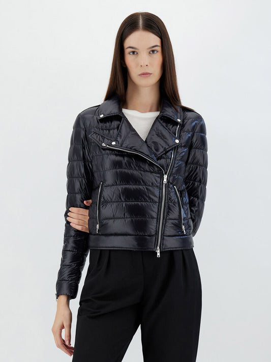 A woman posing in a Herno Bomber Jacket in Ultralight Nylon in Black.