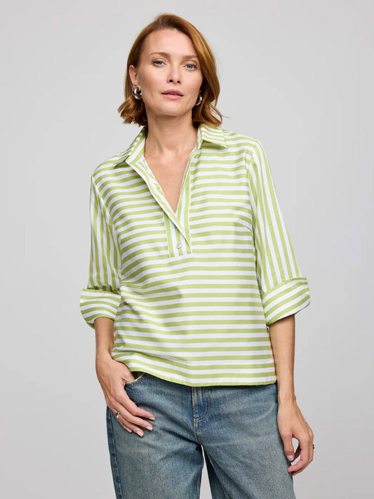 A woman models the Hinson Wu Aileen 3/4 Sleeve Stripe/Gingham Combo Dress in Lime/White against a plain gray background, highlighting its polished, classic style.