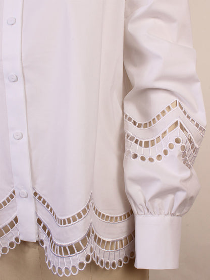 Close-up of the Hinson Wu Bardot Scalloped Blouse in white, showcasing ornate scalloped lace detailing on the hem and sleeves.