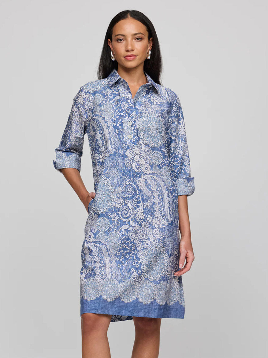 Woman in a Hinson Wu Charlotte dress with a blue/ecru lace print and 3/4 sleeves crafted from luxe cotton.