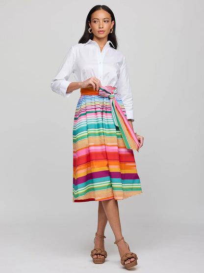 A woman confidently showcases the Hinson Wu Robin 3/4 Sleeve Stripe Dress in White Ombre against a plain background.