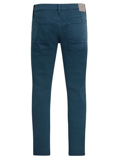 Back view of the Hudson Blake Slim Straight Jeans in Deep Dive, showcasing a teal-colored modern fit with two back pockets and a label on the waistband.