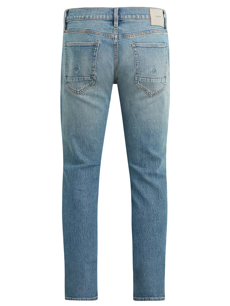 Back view of Hudson Blake Slim Straight Jeans in Blue Cove, showcasing two rear pockets and a visible label on the waistband. Made from comfort stretch denim for a relaxed fit.