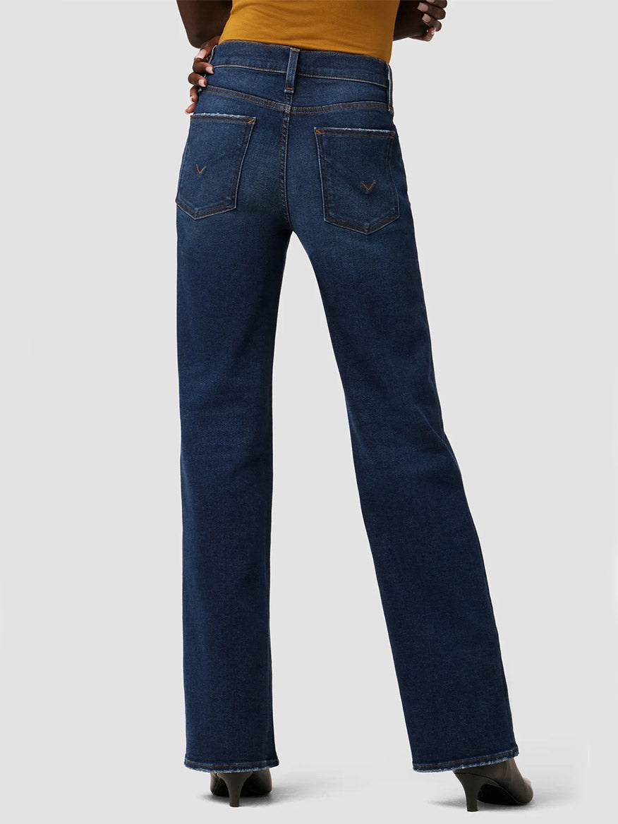 Person wearing Hudson Rosie High-Rise Wide Leg Ankle Jeans in Poseidon viewed from the back.