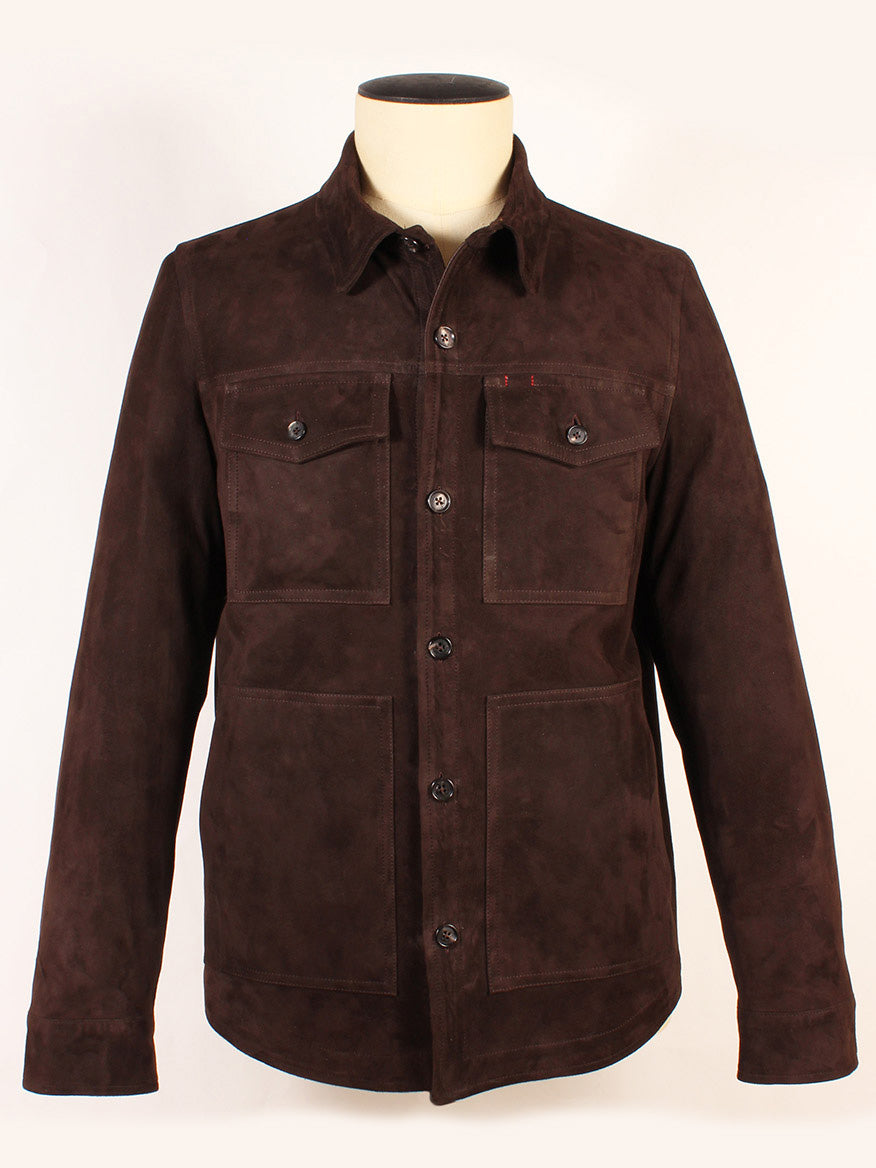 The Isaia Double Suede Overshirt in Brown features a dark brown suede button-up design, with two chest pockets and two lower front pockets, shown on a mannequin against a plain background.