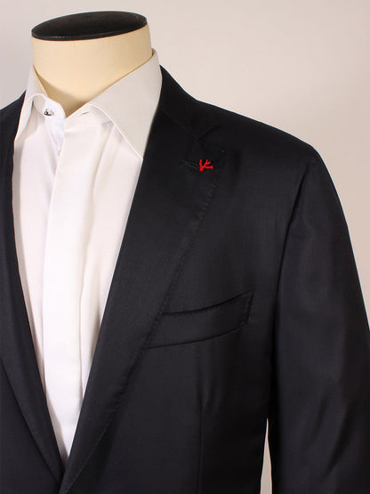A mannequin showcases the Isaia Sanita Dark Blue Suit, made in Italy from a wool-silk blend, featuring a white dress shirt and signature red stitch detail on the lapel.