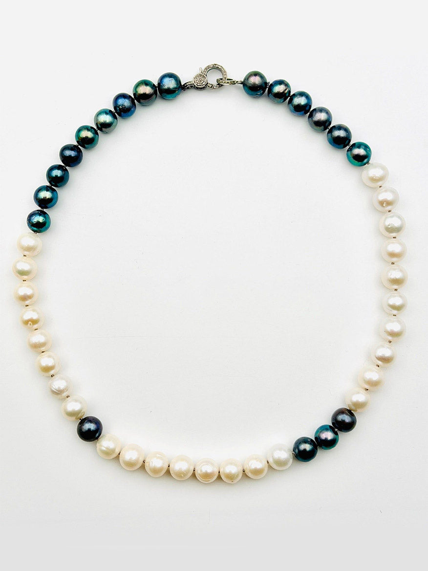 The JMNYC Designs 18" White Peacock Edison Freshwater Pearl Necklace showcases half white pearls and half dark pearls arranged symmetrically, finished with a sterling silver clasp at the top, and is displayed on a plain white background.