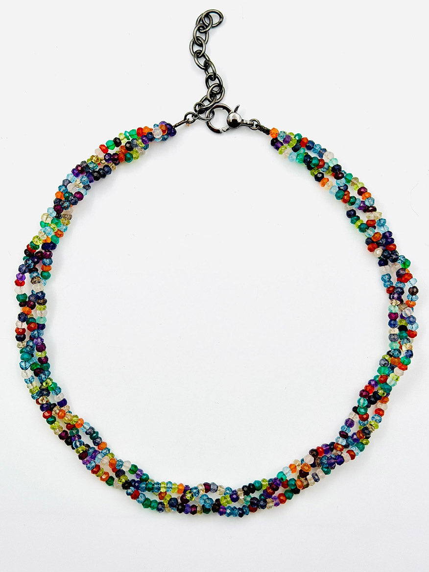JMNYC Designs 18" Triple Strand Faceted Multi Stone Necklace, featuring small faceted multicolor beads and a black adjustable chain clasp, shown against a white background.