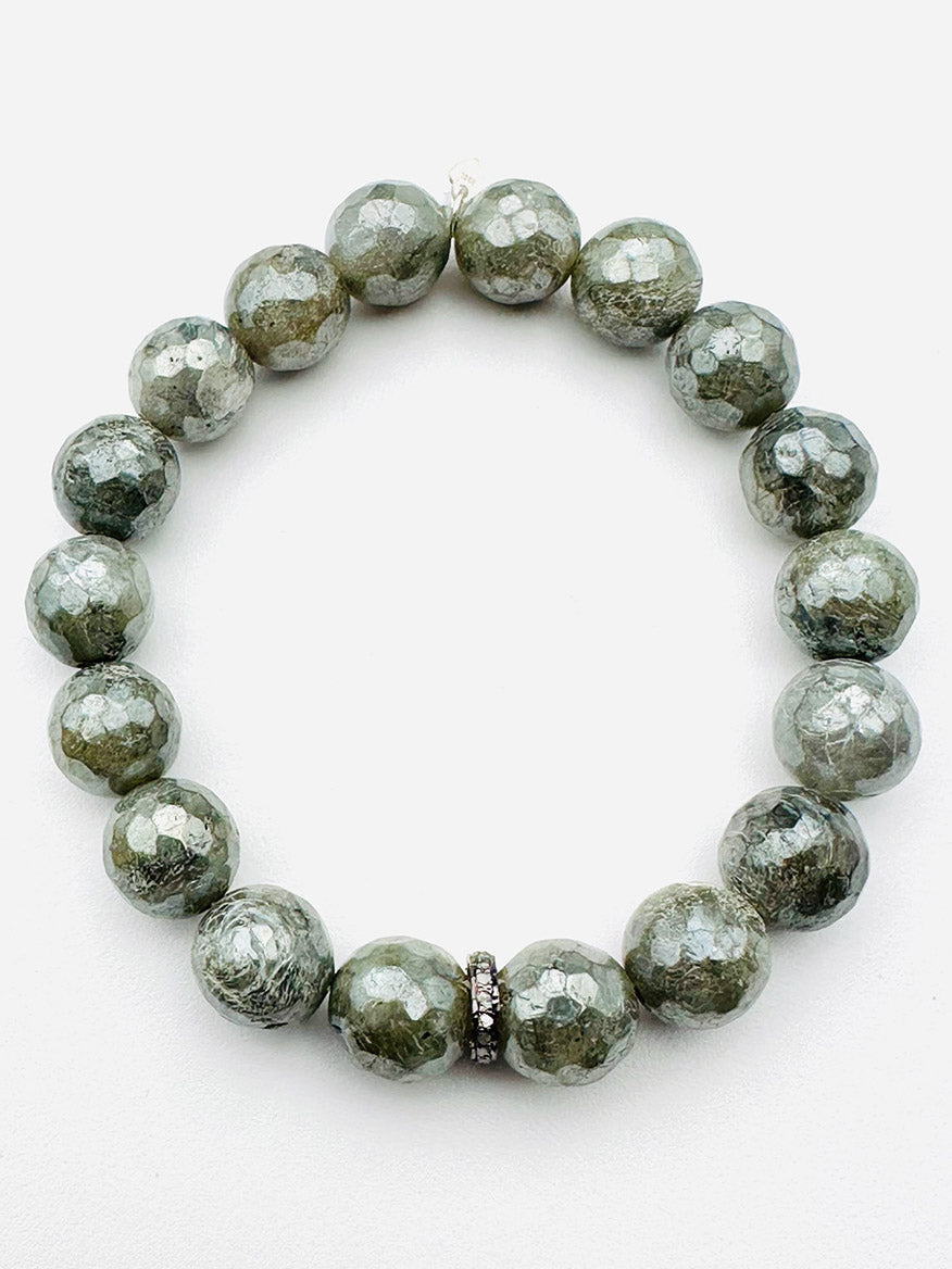 A JMNYC Designs bracelet featuring faceted mystic natural labradorite beads accented with a sterling silver diamond rondelle, displayed on a plain white background.