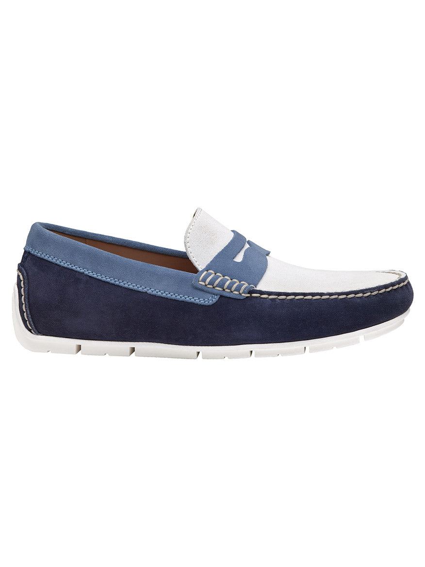 Blue and white J & M Collection Baldwin Driver Penny in Navy Multi English Suede boat shoe isolated on white background.