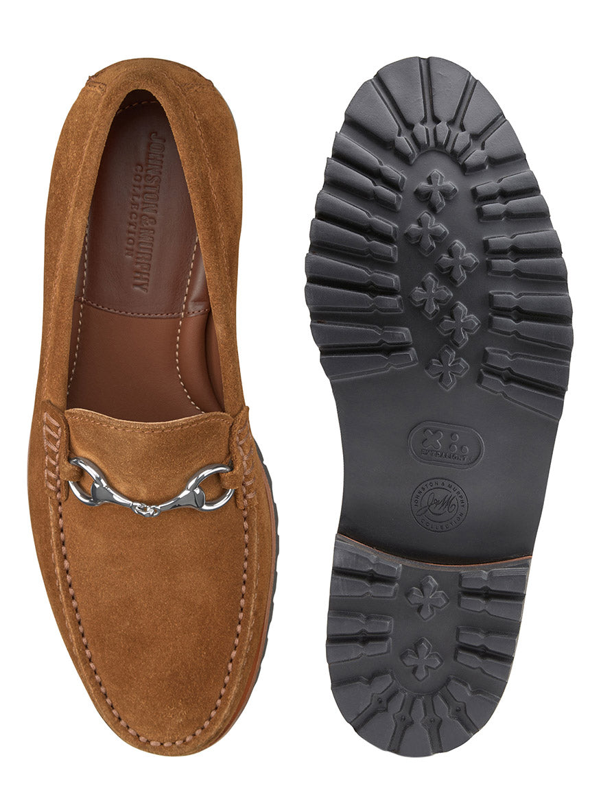 The J & M Collection Baldwin Lug Bit in Snuff English Suede features a moccasin construction with a metal chain detail. Displayed from the top and sole views, these brown loafers boast a durable black EVA lug outsole with textured grip and a comfortable leather insole.