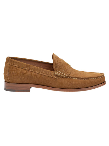 The J & M Collection Baldwin Penny in Snuff English Suede features a moccasin construction with decorative stitching, a low heel, and a leather cushioned footbed for ultimate comfort.