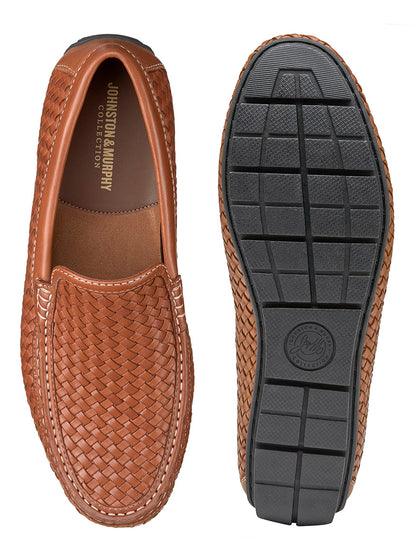 A brown loafer with black sole from the J & M Collection Baldwin Woven in Tan Sheepskin.