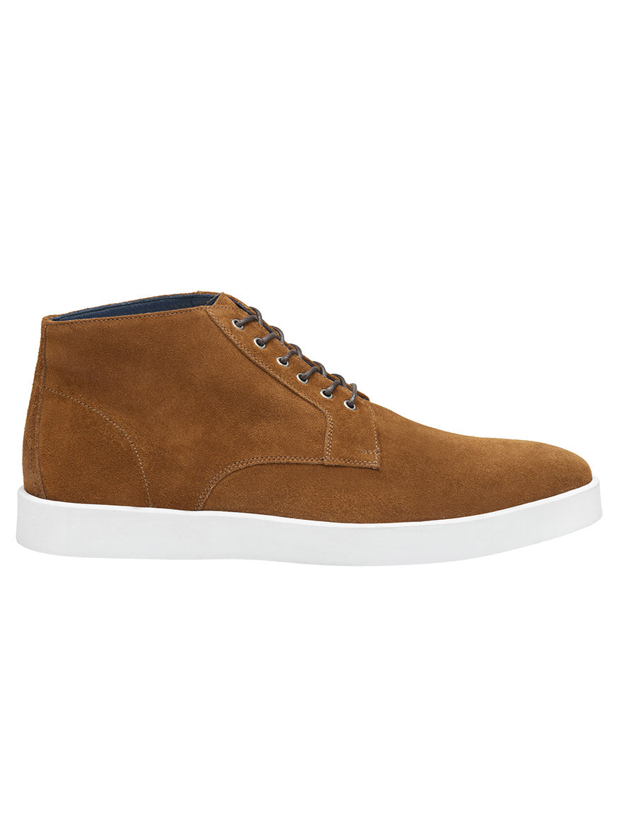 The J & M Collection Bolivar Plain Toe Boot in Snuff Italian Suede is a high-top shoe made from Italian suede leather, with white soles, metal eyelets for laces, and a full leather lining.