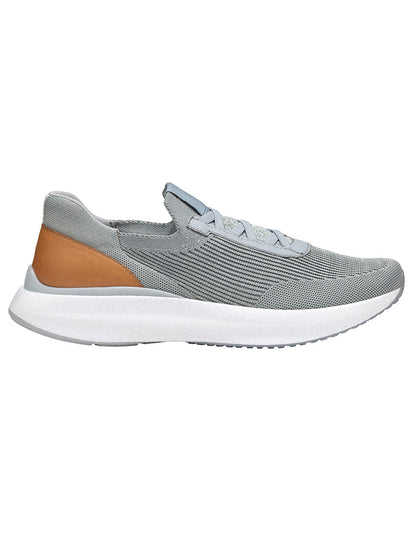 The J & M Collection Briley Knit Jogger in Grey Knit is an athletic shoe with knit uppers, a white sole, and a brown accent on the heel, featuring a memory-foam footbed for optimal comfort.