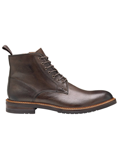 The J & M Collection Hartford Plain Toe Boot in Dark Brown Italian Calfskin features a low heel, round toe, visible welt stitching, and a Vibram outsole, shown here in profile.