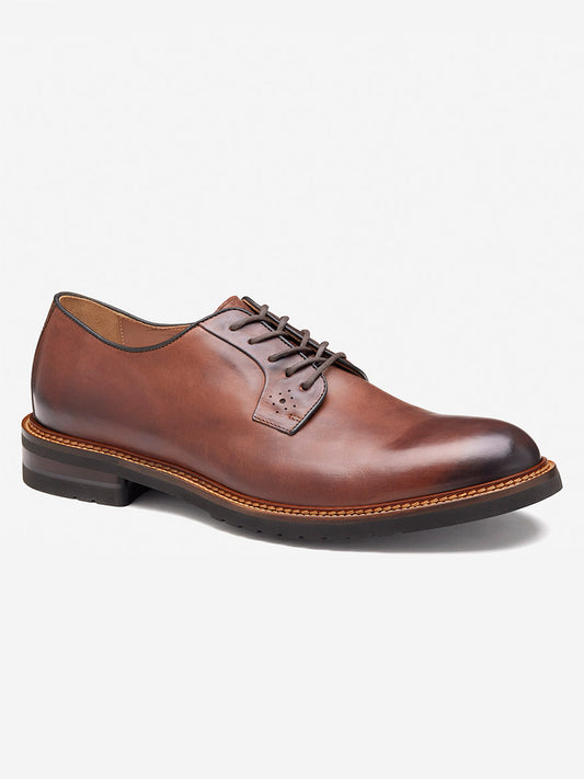 The J & M Collection Hartford Plain Toe in Tan Italian Calfskin is a brown leather oxford dress shoe with dark laces, stitching detail, and a low heel, shown on a white background.
