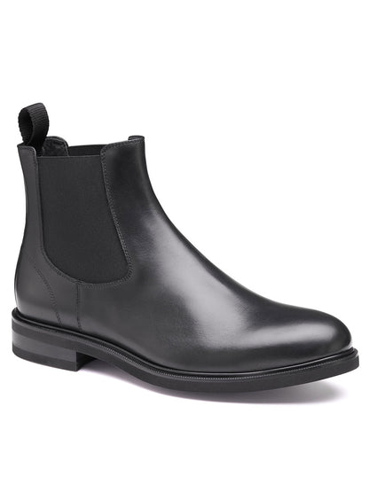 Introducing the J & M Collection Hartley Chelsea Boot in Black Italian Calfskin—featuring a pull tab and elastic side panels, a low heel, rounded toe, and a Vibram EVA outsole for added comfort.