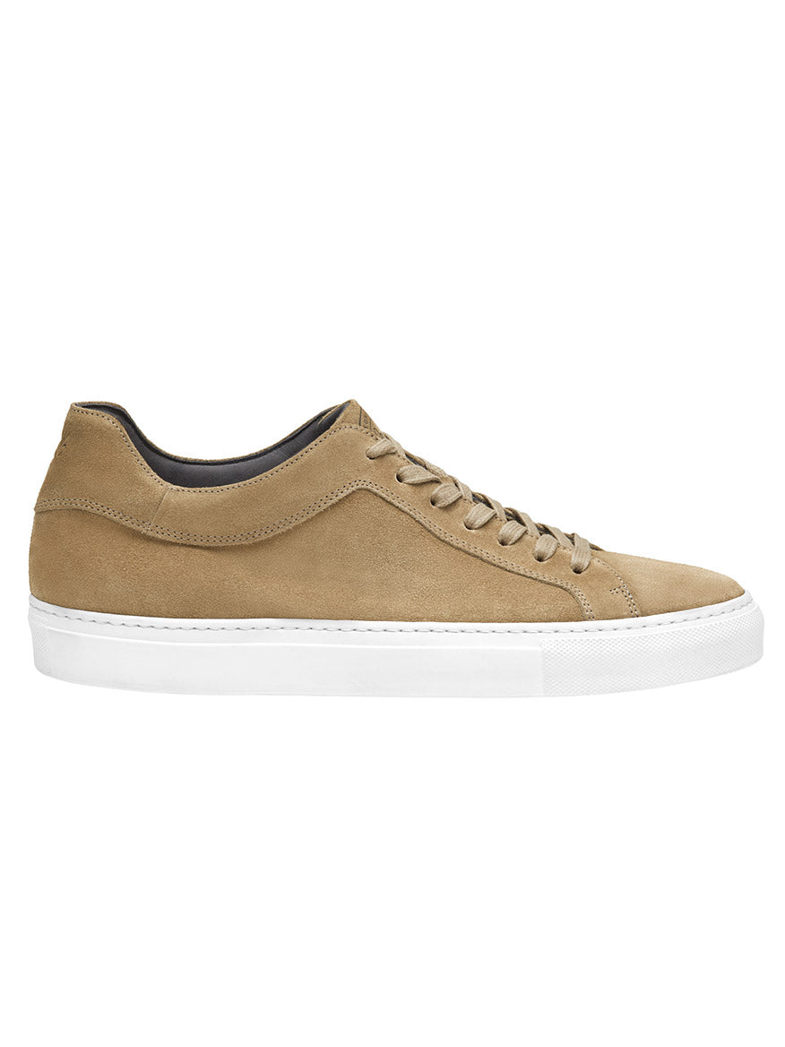 The J & M Collection Jared Lace-To-Toe in Taupe Italian Suede is a low-top sneaker featuring taupe Italian suede, a white rubber sole, beige laces, and a cushioned footbed for added comfort.