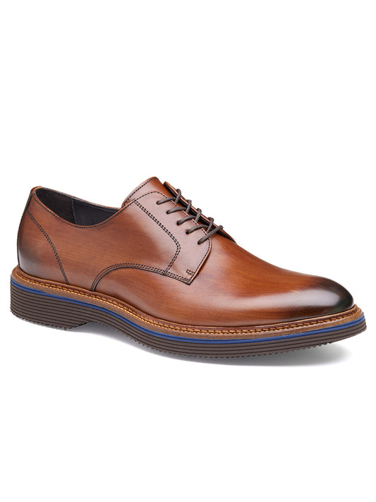 The J & M Collection Jenson Plain Toe in Brown Italian Calfskin is a distinguished dress shoe with black laces, a black sole featuring blue accents, and an upper crafted from premium European calfskin.