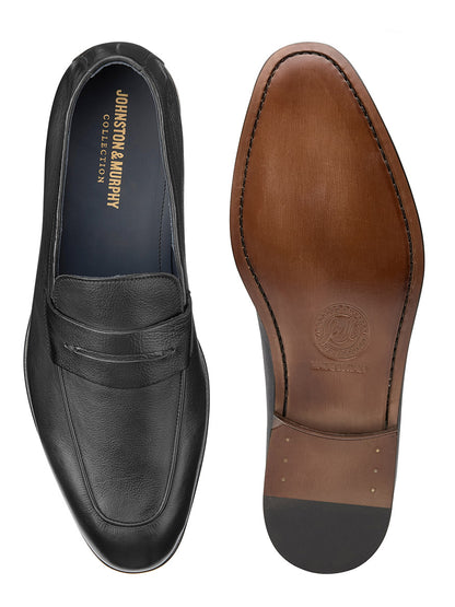 A pair of J & M Collection Taylor Penny in Black Italian Calfskin loafers with a brown sole, crafted for Johnston & Murphy Collection.