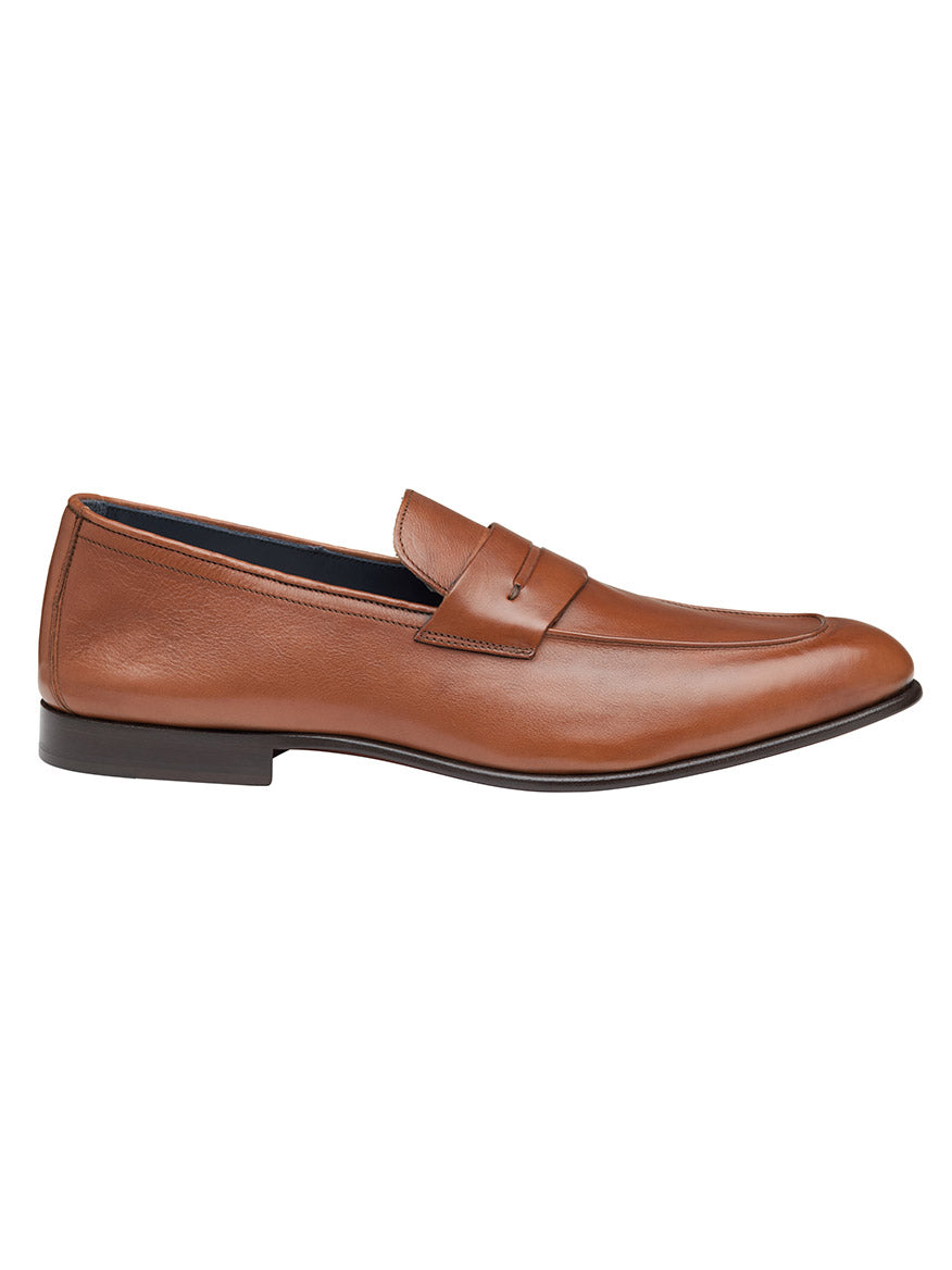 An ultra flexible J & M Collection Taylor Penny in Tan Italian Calfskin loafer with a black leather outsole.