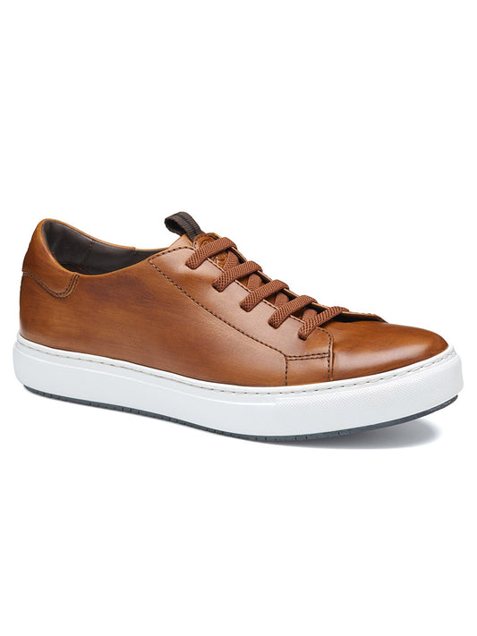 The J & M Collection Anson Lace-to-Toe in hand-stained brown calfskin features matching laces, a white rubber sole for cushioning, and is shown on a plain white background.
