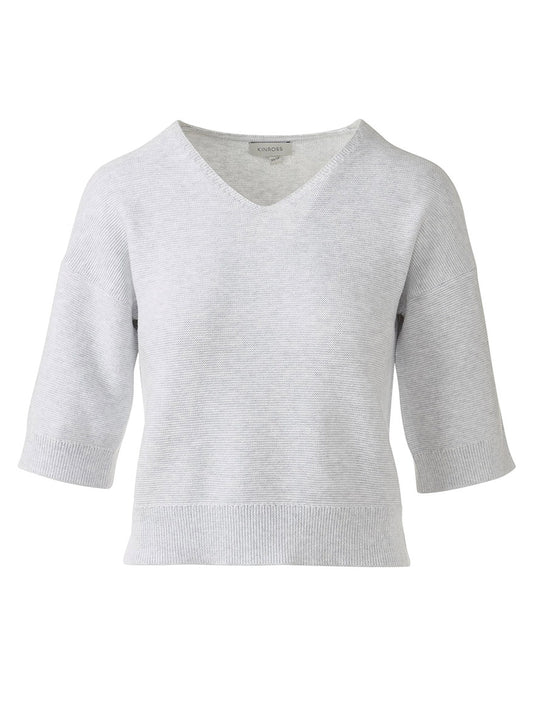The Kinross Garter Easy Vee in Dove is a light gray pullover sweater in SuperSoft Cotton, featuring a V-neckline, half sleeves, and ribbed cuffs and hem in refined garter stitch, shown on a plain white background.