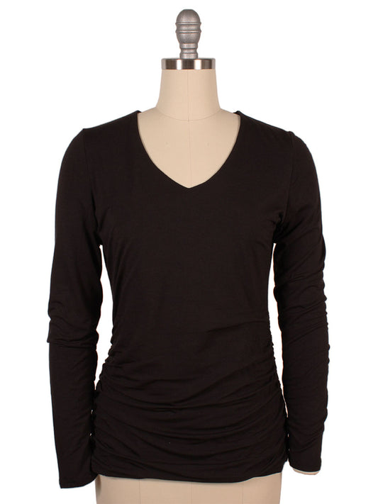 Kinross Ruched Long Sleeve Vee in Black displayed on a dress form mannequin, ruched detailing adding a touch of elegance, isolated on a white background.