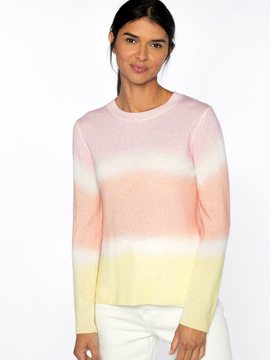 A woman wearing a Kinross Painted Stripe Crew in Rosa Multi cashmere sweater.