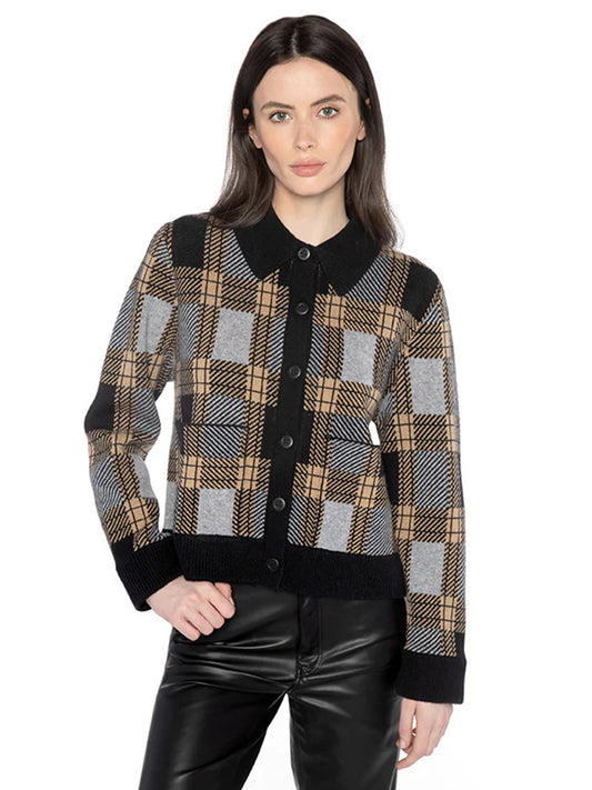 Someone is wearing the Kinross Short Plaid Shacket in Black Multi with black pants, posing elegantly against a plain white background.