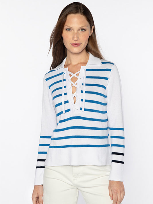 Woman wearing a Kinross Stripe Lace Up Polo in White/Azul/Navy with long sleeves.