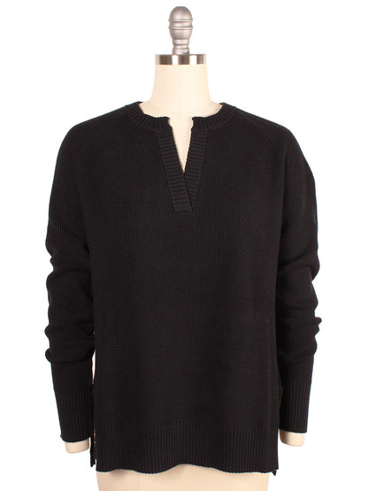 A black Kinross Thermal Hi Low Henley with long sleeves and a V-notch neckline displayed on a mannequin.