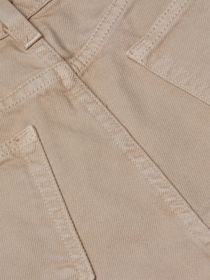 Close-up view of the L'Agence Alicent Wide-Leg Jean in Pale Khaki, showcasing beige denim fabric, detailed stitching, and pocket corners—all expertly crafted in Los Angeles.