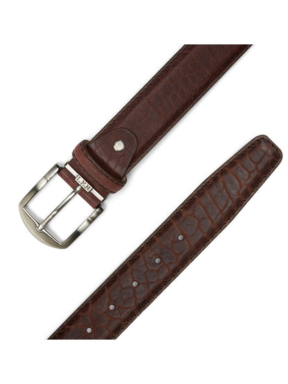 The LEN Belts American Bison Belt in Brown, made with meticulous attention to detail in the USA, showcases a silver buckle and multiple holes for easy adjustment. This accessory, shown from two angles against a white background, is ideal for introducing a hint of American Bison-inspired flair to any ensemble.