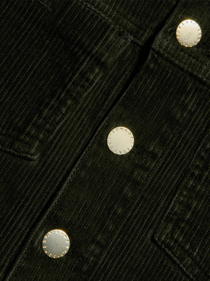 Close-up of the L’Agence Janelle Corduroy Jacket in Army, highlighting the black stretch corduroy fabric with three metallic buttons and its textured vertical ridges—perfect for a slim fit silhouette.