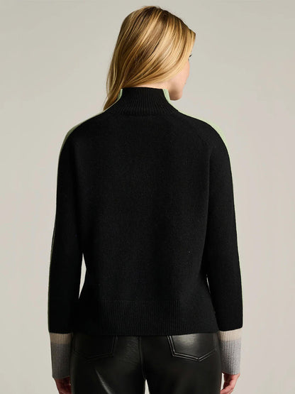 Back view of the Lisa Todd High Spirits Mock in Onyx, featuring a relaxed raglan silhouette with light green accents on the shoulders and contrasting grey-toned cuffs.