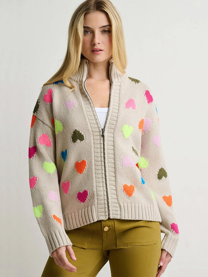Lisa Todd Love Zip Cardigan in Chickpea: an oversized beige zip sweater featuring a multicolored heart pattern.