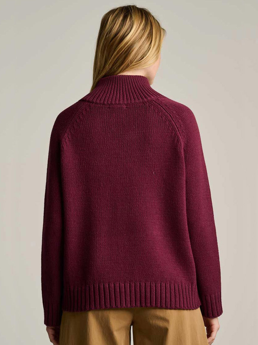 Back view of the Lisa Todd Take Aim Sweater in Wine, a chunky cotton knit with a mock turtleneck, ribbed cuffs, and a ribbed hem.