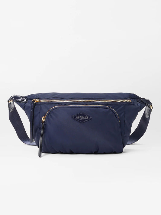 Navy blue MZ Wallace Chelsea Sling Bag in Dawn Bedford with zipper closures on a white background.