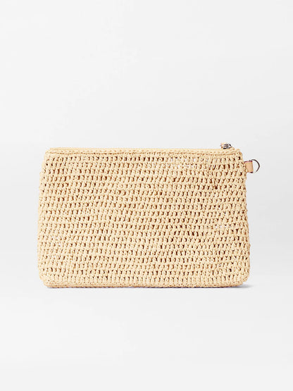 The MZ Wallace Crochet Clutch in Crochet/Camel, a rectangular woven beige summer bag with a zipper closure, is shown against a plain white background.